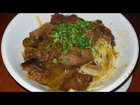 Very Yummy Yellow Noodles In Bowl Of Braised Beef Soup - Awesome Food