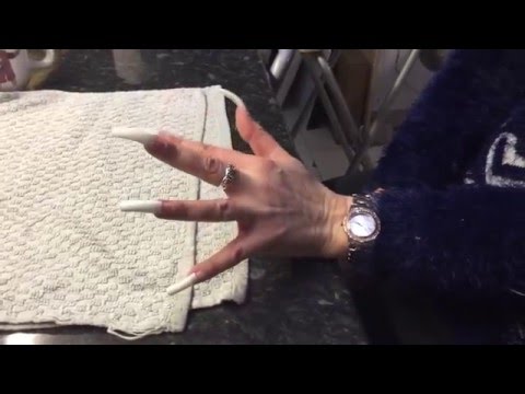 Woman Grows Nails For Twenty Years - Longest Nails In The World Crazy !!