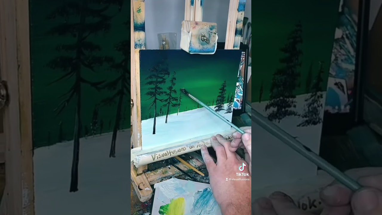 Painting Trees in the Snowy Aurora Borealis