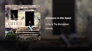 Scissors in the Sand