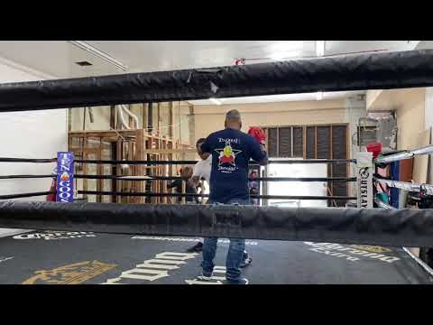 Ricky Funez working mitts with former boxer Jeff Crawford