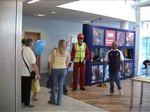 mannequin-man performming as a Living Mannequin: human statue performer acting as a display mannequin, dropping a shovel to get memberd of the public to put it back in his hand, and scaring them by coming alive. for Arco on 14/07/2002