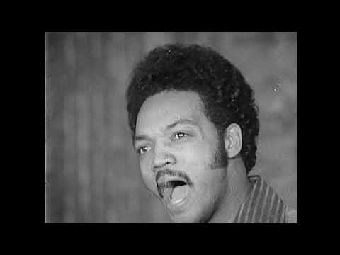 "I am somebody!" - Historical footage of Rev. Jesse Jackson leading a crowd in a chant of solidarity