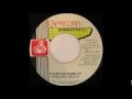 Gregory Isaacs - Champion Bubbler + Version