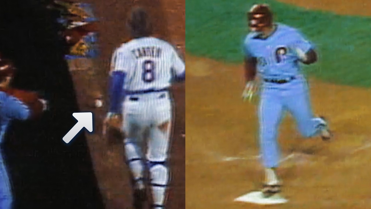 Mike Schmidt scores from first base on a passed ball