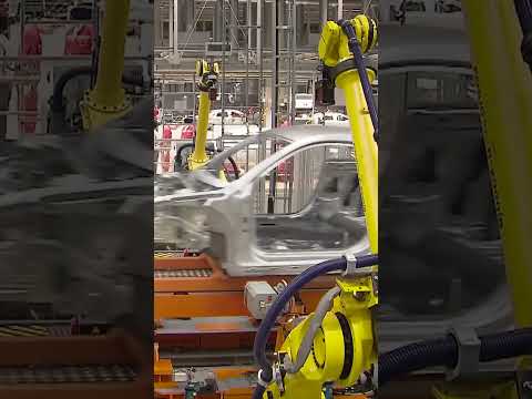, title : 'Robotic Assembly Line at AUDI'