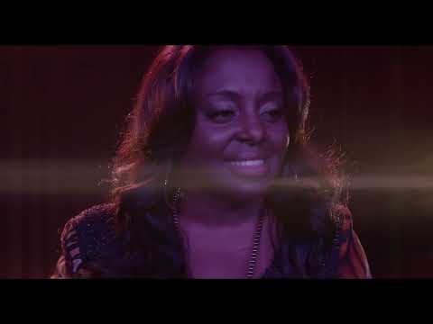 Spinning Gold performance montage from the trailer with cast members singing and playing instruments on stage