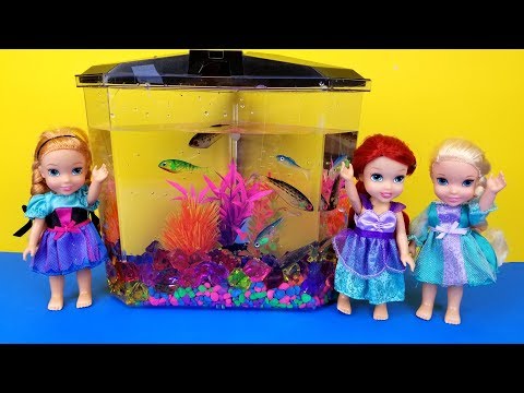 FISH TANK ! Elsa and Anna toddlers visit Ariel's house - aquarium decorating - playdate - prank