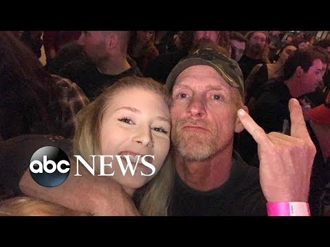 Daughter signs for her deaf dad at rock concert