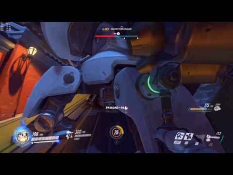 Torbjörn & Reinhardt sit on a Payload.