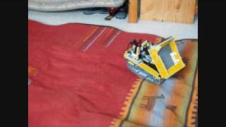preview picture of video 'LEGO Dump Truck Moving On Rough Terrain'