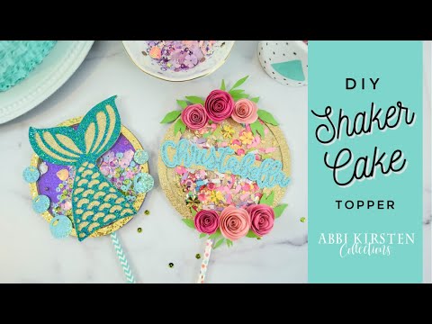 Part of a video titled DIY Shaker Cake Topper Tutorial - YouTube