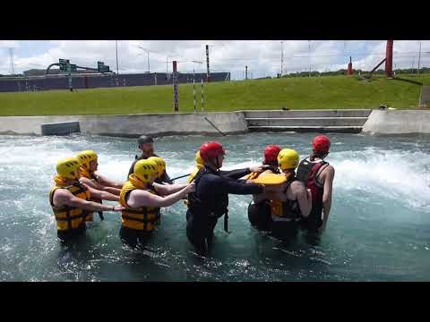 Students carrying out river crossing skills