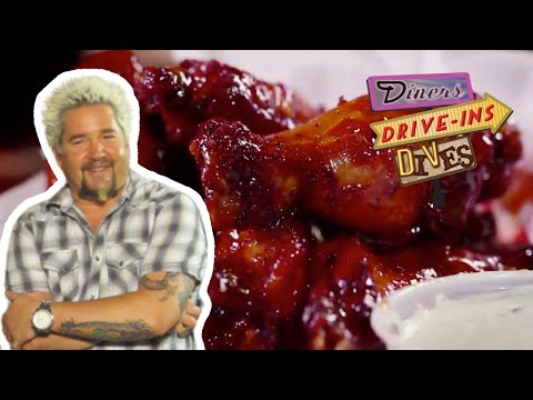 Guy Fieri Tries Award-Winning Smoked Chicken Wings | Diners, Drive-ins and Dives | Food Network
