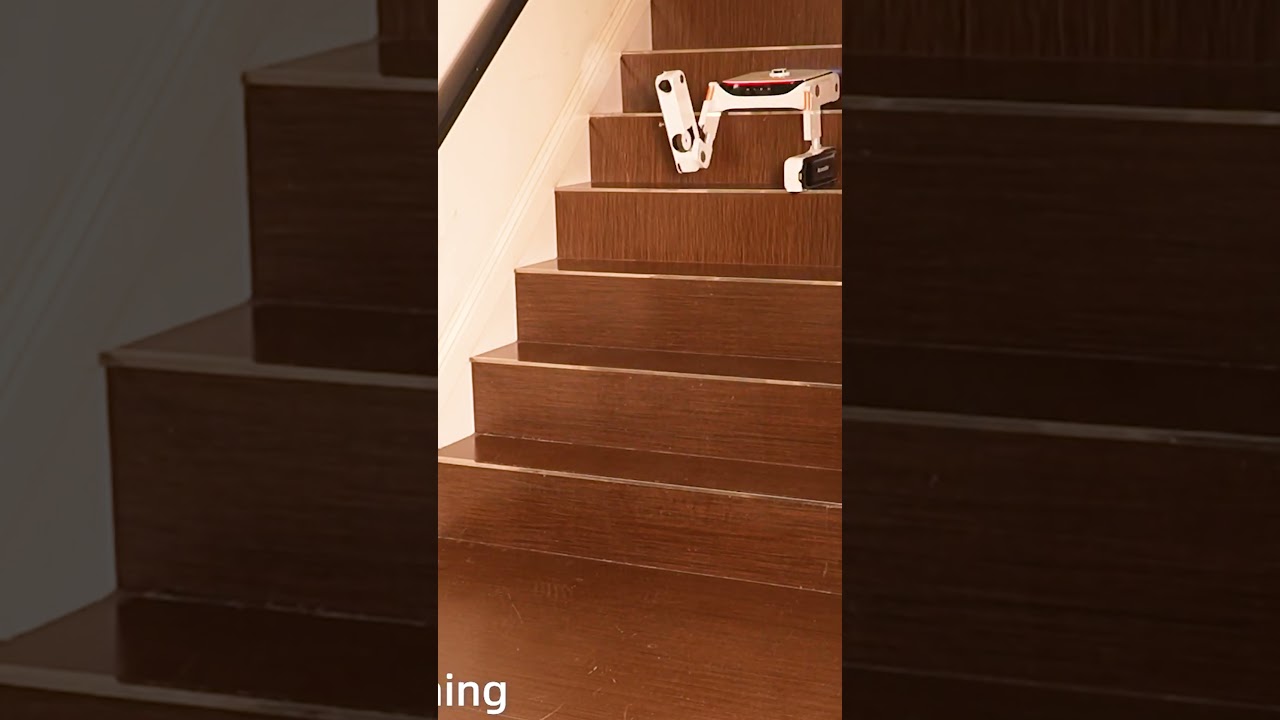 How does this vacuum cleaner climb stairs?