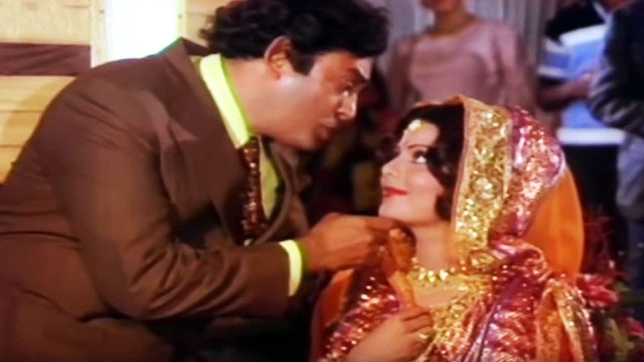 Mujh Ko To Katil Ki Itni Pehchaan Hai, Bhola Bhala Chehra Hai Dil Baimaan Hai Lyrics | Uljhan | Sudesh Kumar, Mohammed Rafi, Asha Bhosle | Kalyanji Anandji