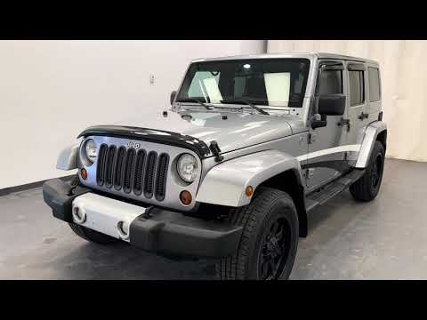 2013 Jeep Wrangler Unlimited 4WD 4dr Sahara in Silver for sale at Davis GMC Buick Lethbridge in Lethbridge, AB