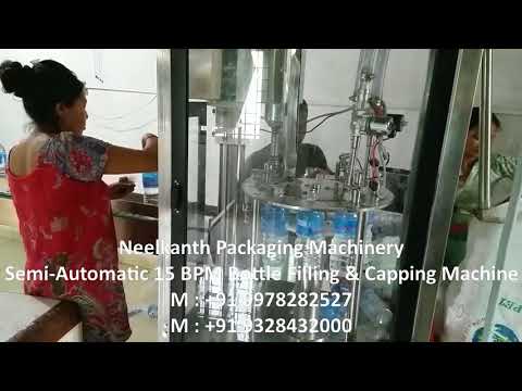 Neelkanth Packaging Machinery - Semi Automatic 15 BPM Bottle Filling & Capping Machine, india