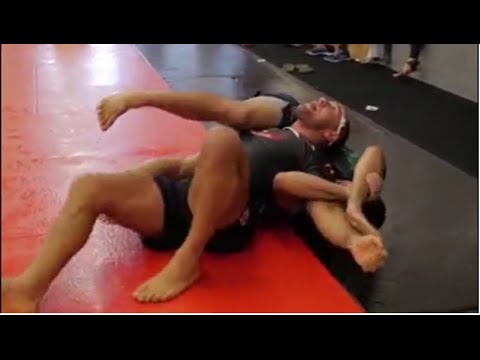 JiuJitsu.com Technqiues: 50/50 of the Arms Kimura Funnels (Cool Move)