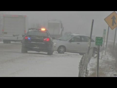 Heavy snow, slick roads causing delays, accidents