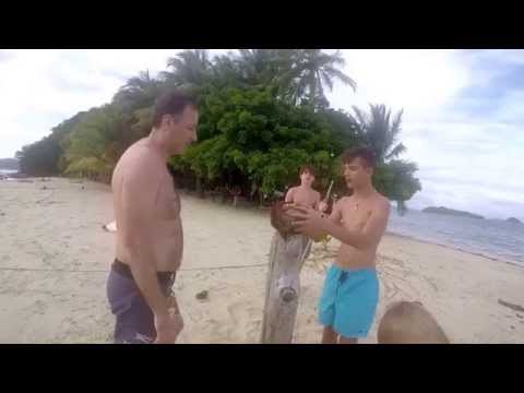 Port Barton drinking coconut