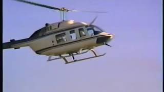 Accident with Bell Helicopter dropping loudspeakers. Very close call and dangerous situation.
