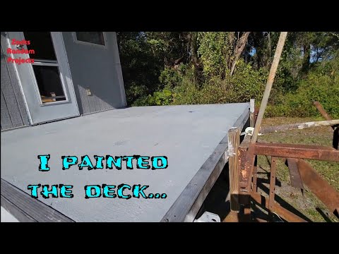 Sanded and painted houseboat front deck.