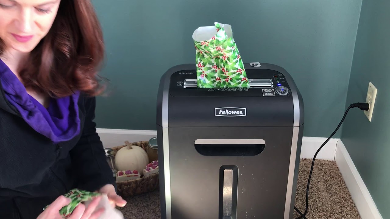 Shred used wrapping paper for gift bags