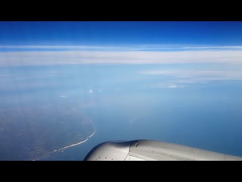 Coastline of France and England from airplane - White cliff of Dover - 4K UltraHD