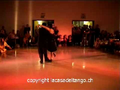 Corina de la Rosa  and  Julio Balmaceda  are  dancing  to  a  tango