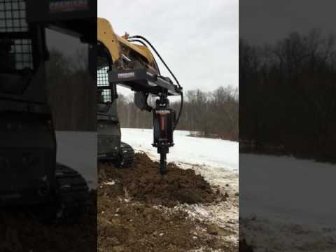 Two-Speed Earth Auger In Action: Premier Attachments