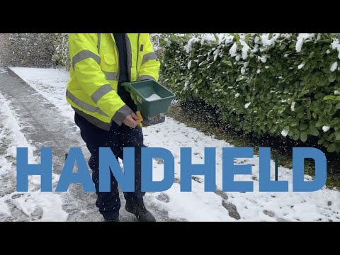 Handheld gritting salt spreader