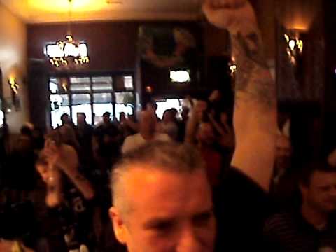 ALL BLACKS VICTORY RITCHIE TAKES THE CUP over france in BRU BAR AND HOSTEL McCURTAIN STREET CORK IRELAND CELEBRATING 2011 WIN