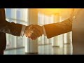 videoblocks the two businessmen handshake on the sunny background slow motion sblwcdsylm  D