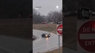WATCH: Driver Jumps Out of Car Sliding on Ice!