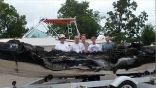 preview picture of video 'Recovering a burned boat that sank in Pelican Lake'