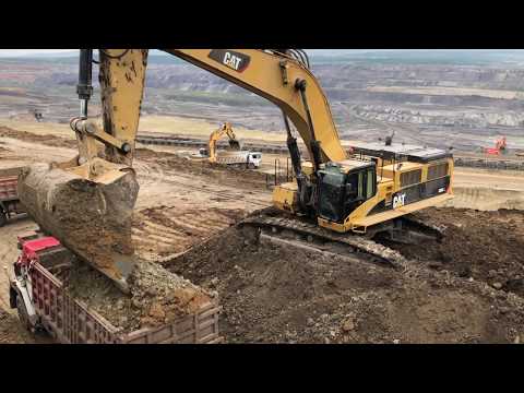 Caterpillar 385C Excavator Loading Mercedes And Man Trucks - Labrianidis SA