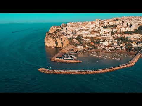 Aerial drone 4K video of coastal town of Peschici, Gargano, Puglia, Italy