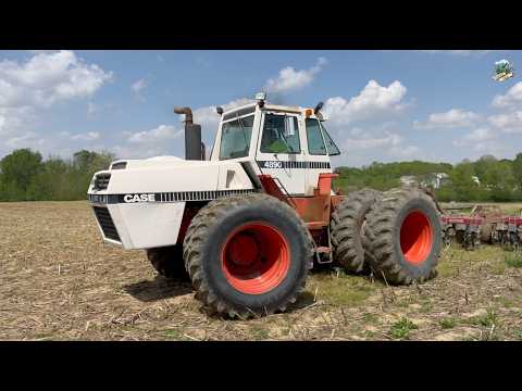 Case 4890 Tractor pulling a Salford Vertical Tillage Tool