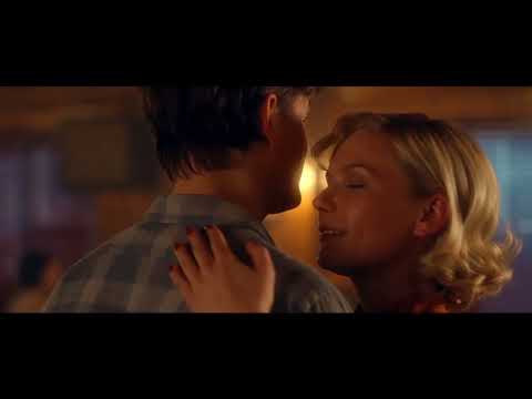 Trailer montage — club band in mid-solo, dashboard at night, roadside dawn as guitar ostinato hums