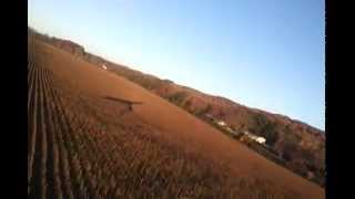 preview picture of video 'Quicksilver ultralight flying low and slow over fields.'