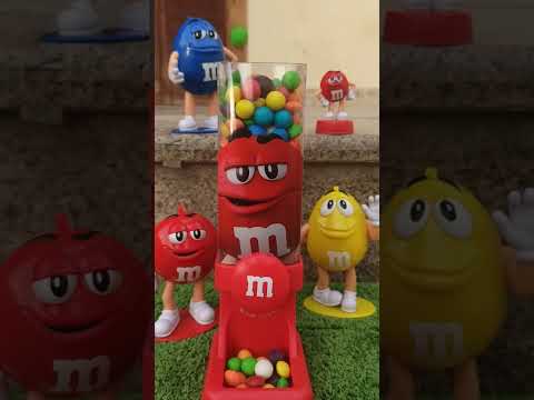 FILLING UP THE M&M DISPENSER WITH THE M&M CANDY #mnm #shorts #viral #youtubeshorts