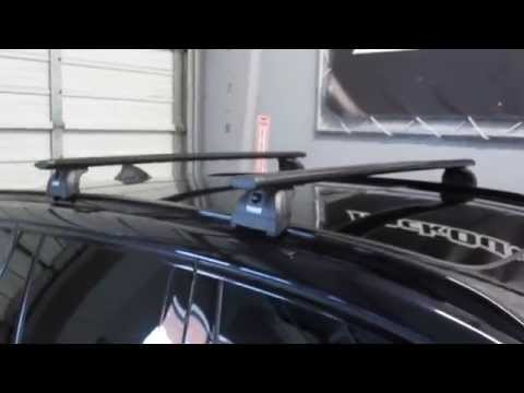 2013 BMW X3 with Thule 460R Podium AeroBlade Roof Rack by Rack Outfitters