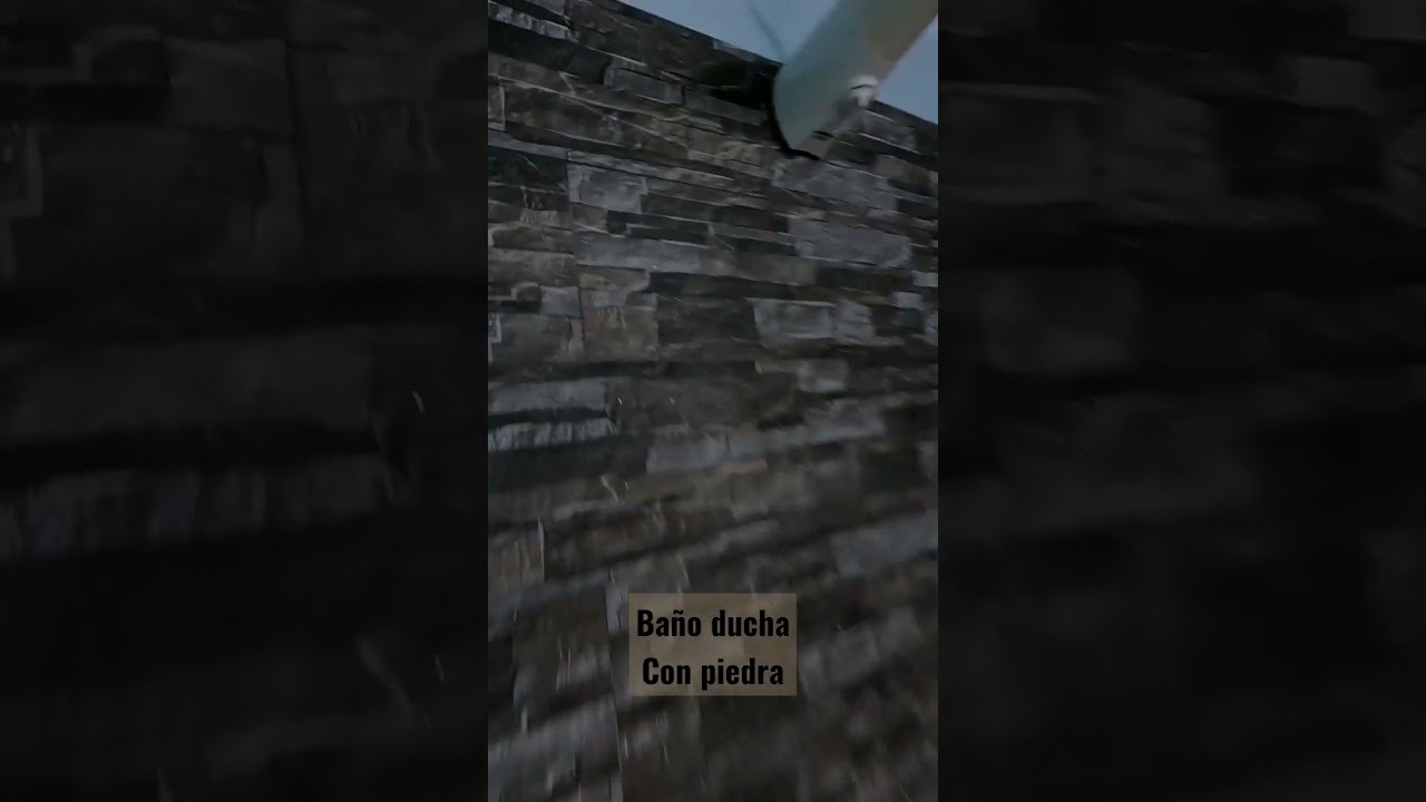 baño ducha con piedra pequeño y moderno