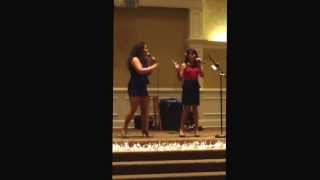 Christina Elena Guzman and Priscilla Maylin Guzman singing Santa clause is coming to town