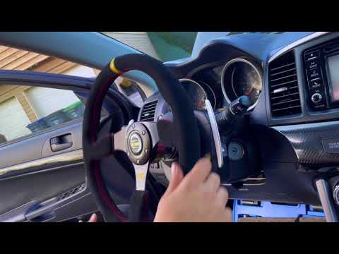 NRG QUICK RELEASE 2.0 ON MITSU LANCER 16' Satisfying ''Ding" sound when in lock position.