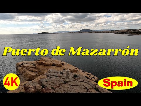 We visited Puerto de Mazarrón. The weather was changeable. There is a walkway built on # Spain