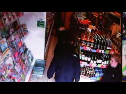 Violent gang targets family store - CCTV footage