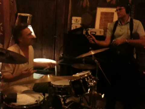 jon cleary on drums and piano