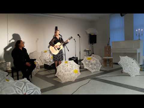 Angelas. Dainuoja muzikos autorė Rima Žudienė. Eilės Albino Kuliešio. Renginys Poezijos ir gitaros improvizacijos Rokiškio Juozo Keliuočio viešojoje bibliotekoje.